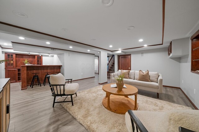 1920 Chatfield Rd, Columbus, OH 43221 - living area with bar, baseboards, stairway, recessed lighting, and light wood-style floors