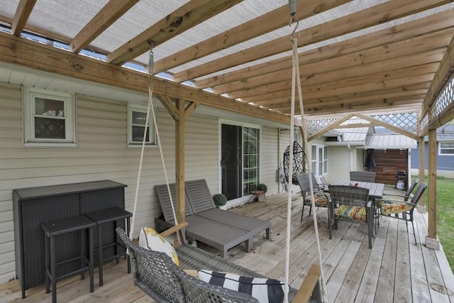 deck with outdoor dining space