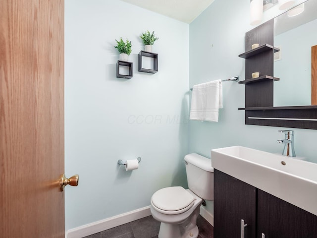 681 Millcrest Dr Unit 681, Marysville, OH 43040 - bathroom featuring baseboards, tile patterned flooring, vanity, and toilet