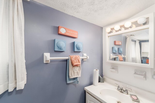 6065 Batavia Rd, Westerville, OH 43081 - bathroom with a textured ceiling and vanity