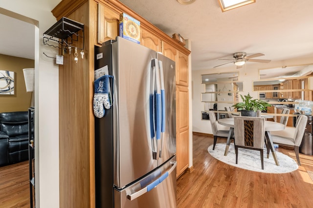 6065 Batavia Rd, Westerville, OH 43081 - kitchen featuring freestanding refrigerator, a ceiling fan, baseboards, and light wood finished floors