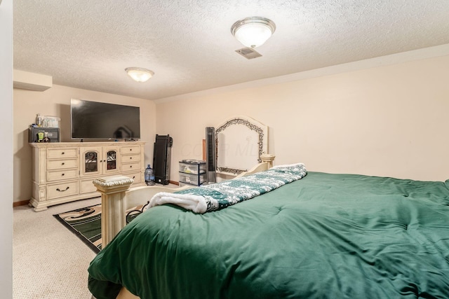 6065 Batavia Rd, Westerville, OH 43081 - bedroom featuring visible vents, a textured ceiling, baseboards, and light carpet