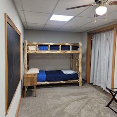 16900 Thompson Ridge Rd, Laurelville, OH 43135 - carpeted bedroom with a paneled ceiling and a ceiling fan