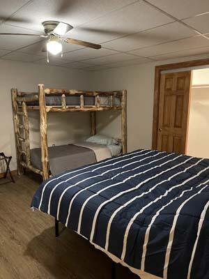 16900 Thompson Ridge Rd, Laurelville, OH 43135 - bedroom featuring wood finished floors and a ceiling fan