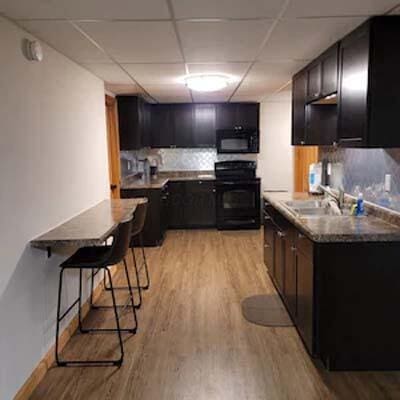 16900 Thompson Ridge Rd, Laurelville, OH 43135 - kitchen featuring light wood-style floors, a drop ceiling, black appliances, and a sink