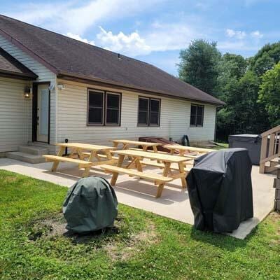 16900 Thompson Ridge Rd, Laurelville, OH 43135 - rear view of house featuring a patio area and a lawn
