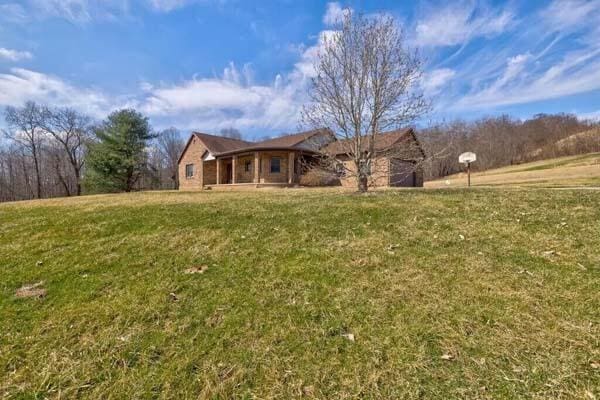 16900 Thompson Ridge Rd, Laurelville, OH 43135 - view of front of property with a front yard
