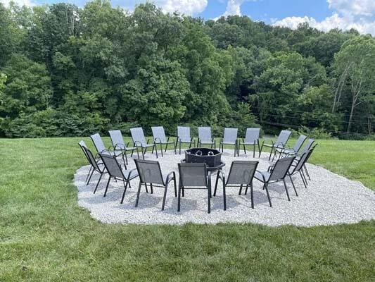 16900 Thompson Ridge Rd, Laurelville, OH 43135 - view of patio / terrace with an outdoor fire pit and a wooded view