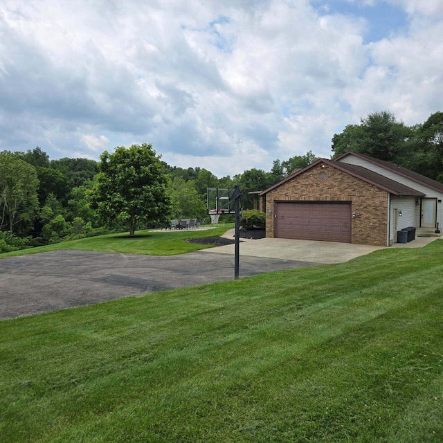 16900 Thompson Ridge Rd, Laurelville, OH 43135 - view of home's exterior featuring driveway, a yard, and brick siding