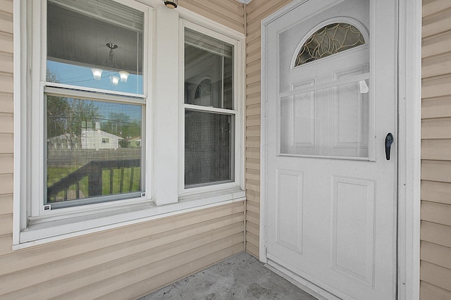 doorway to property with a porch