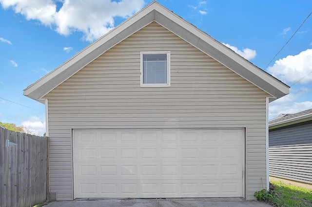 garage with fence