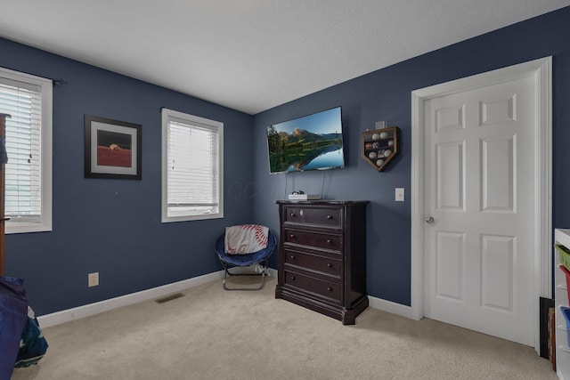 bedroom with visible vents, baseboards, and carpet floors