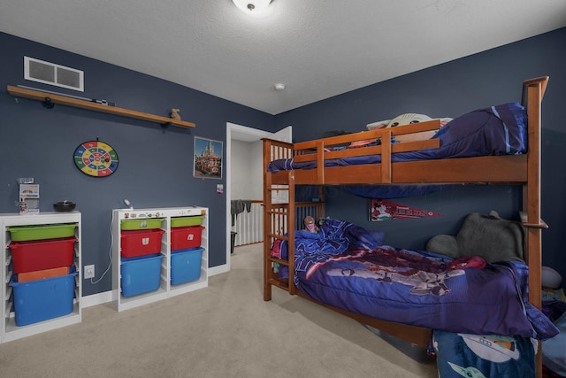 bedroom featuring carpet flooring, baseboards, and visible vents