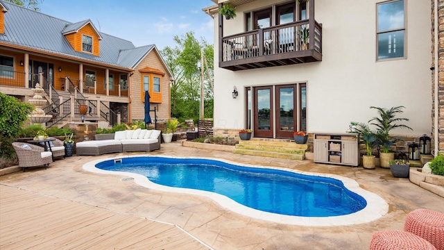 11290 Honeycreek Rd NW, Thornville, OH 43076 - outdoor pool featuring french doors, a patio, outdoor lounge area, stairway, and entry steps