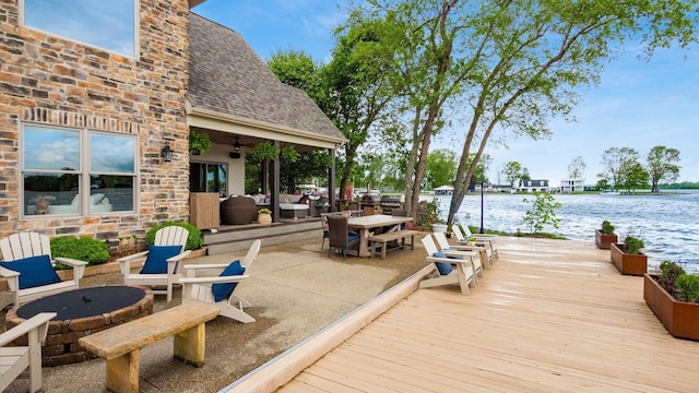 11290 Honeycreek Rd NW, Thornville, OH 43076 - dock featuring a water view, a patio area, an outdoor hangout area, and outdoor dining space