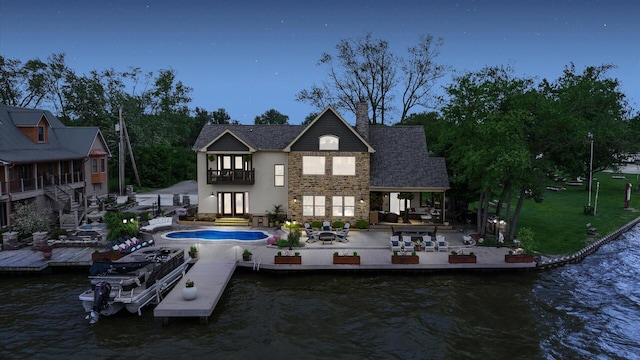 11290 Honeycreek Rd NW, Thornville, OH 43076 - back of property featuring a balcony, a patio, a chimney, and a water view