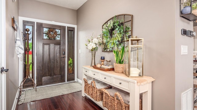 11290 Honeycreek Rd NW, Thornville, OH 43076 - entrance foyer with dark wood-style flooring and baseboards