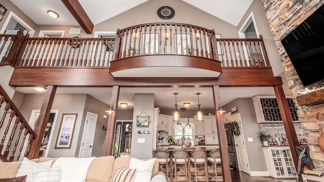 11290 Honeycreek Rd NW, Thornville, OH 43076 - living area with stairway, dark wood-style floors, and lofted ceiling
