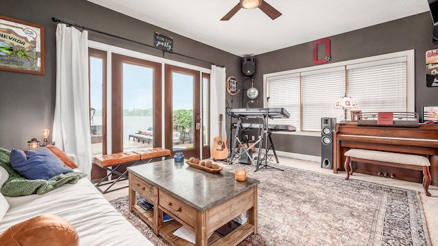 11290 Honeycreek Rd NW, Thornville, OH 43076 - carpeted living area with a ceiling fan, a water view, and baseboards