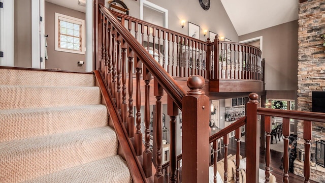 11290 Honeycreek Rd NW, Thornville, OH 43076 - staircase featuring high vaulted ceiling