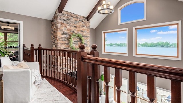 11290 Honeycreek Rd NW, Thornville, OH 43076 - corridor featuring wood finished floors, high vaulted ceiling, beamed ceiling, and an upstairs landing