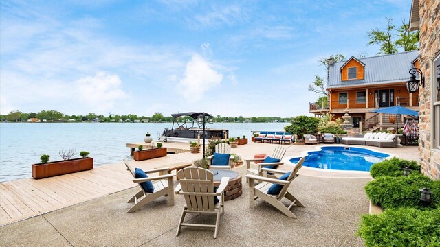 11290 Honeycreek Rd NW, Thornville, OH 43076 - outdoor pool with an outdoor living space with a fire pit, a water view, a patio area, and a boat dock