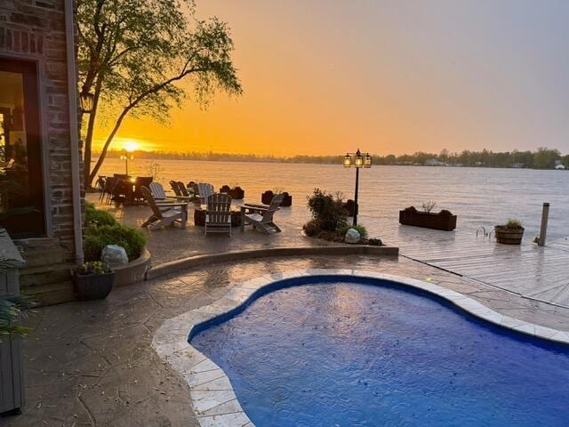 11290 Honeycreek Rd NW, Thornville, OH 43076 - swimming pool featuring a patio and a water view