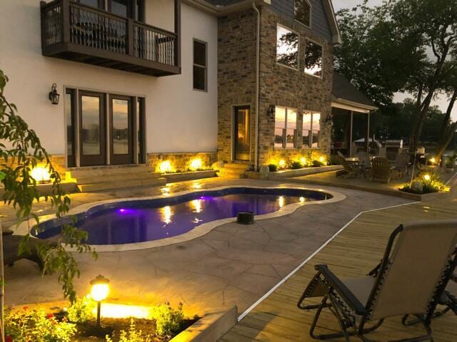 11290 Honeycreek Rd NW, Thornville, OH 43076 - outdoor pool featuring a patio, a fireplace, and outdoor dining space