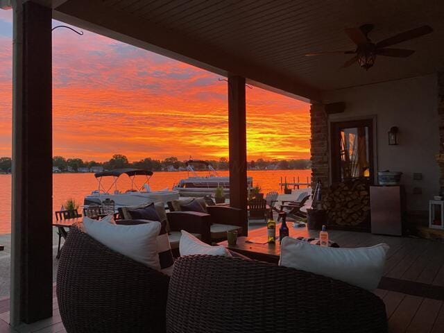 11290 Honeycreek Rd NW, Thornville, OH 43076 - patio terrace at dusk with a water view and ceiling fan