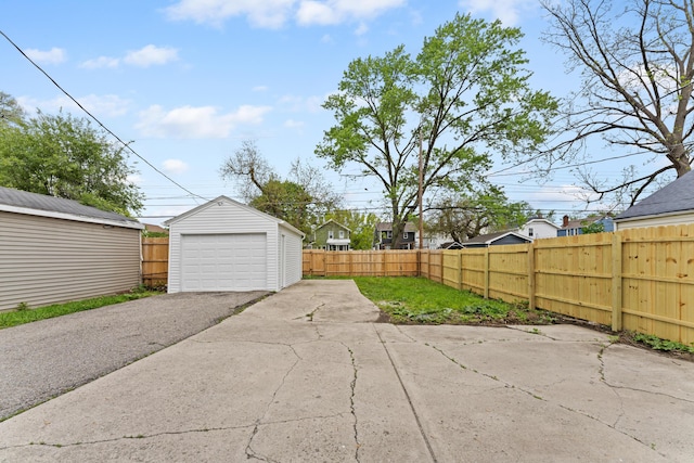exterior space with aphalt driveway and fence