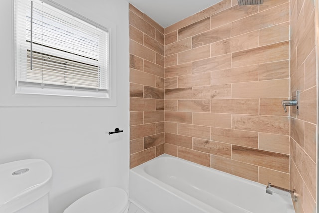 full bath featuring toilet and bathing tub / shower combination