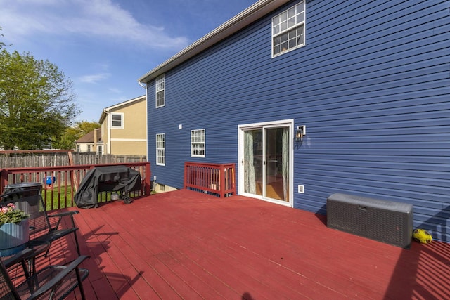 wooden deck featuring fence