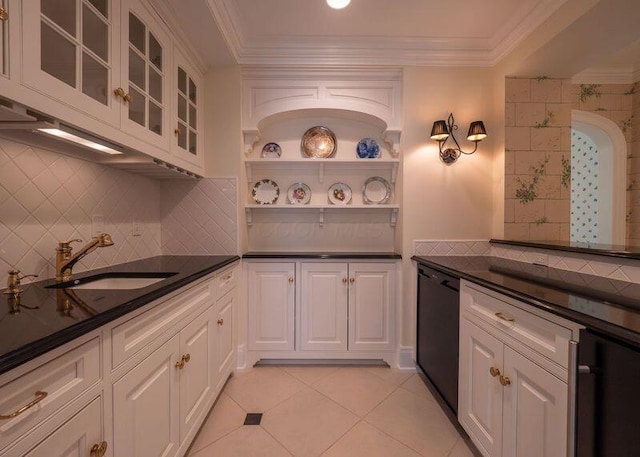 2528 Onandaga Dr, Upper Arlington, OH 43221 - kitchen featuring a sink, dark countertops, tasteful backsplash, and ornamental molding