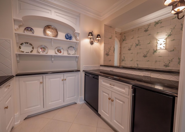 2528 Onandaga Dr, Upper Arlington, OH 43221 - kitchen with dark countertops, black dishwasher, ornamental molding, light tile patterned floors, and white cabinets