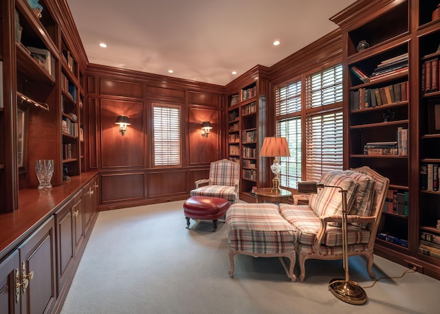 2528 Onandaga Dr, Upper Arlington, OH 43221 - sitting room with plenty of natural light, crown molding, built in shelves, recessed lighting, and a decorative wall