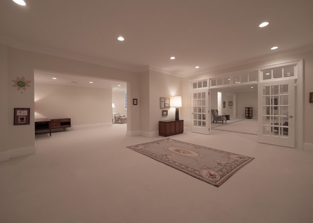 2528 Onandaga Dr, Upper Arlington, OH 43221 - unfurnished living room featuring french doors, crown molding, recessed lighting, carpet flooring, and baseboards