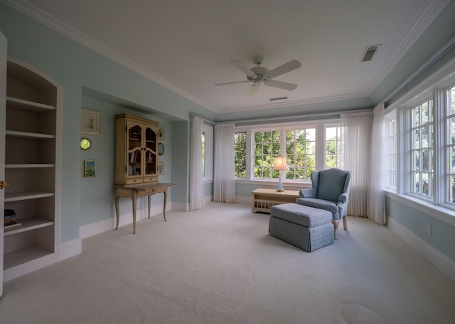 2528 Onandaga Dr, Upper Arlington, OH 43221 - living area featuring built in shelves, a ceiling fan, baseboards, carpet floors, and ornamental molding