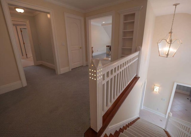 2528 Onandaga Dr, Upper Arlington, OH 43221 - corridor with a chandelier, baseboards, crown molding, and carpet floors