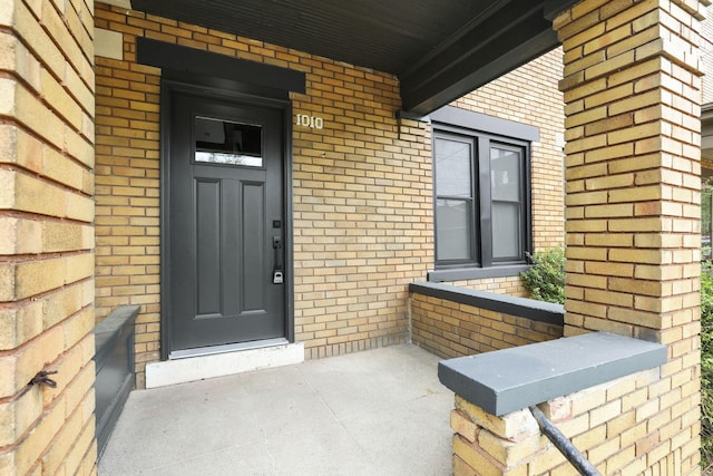 1010 Bruck St, Columbus, OH 43206 - property entrance with covered porch and brick siding