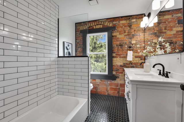 1010 Bruck St, Columbus, OH 43206 - bathroom with double vanity, a washtub, walk in shower, a sink, and tile patterned floors