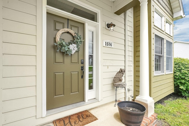 doorway to property with a porch