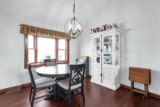 dining room featuring vaulted ceiling, a notable chandelier, baseboards, visible vents, and dark wood-type flooring