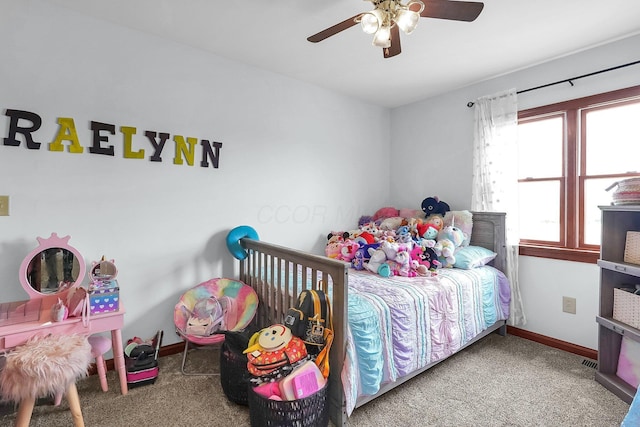 bedroom featuring carpet floors, baseboards, and a ceiling fan