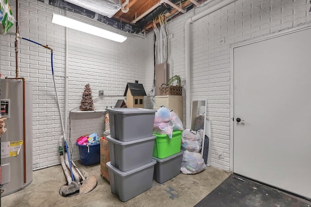 unfinished below grade area with brick wall and water heater