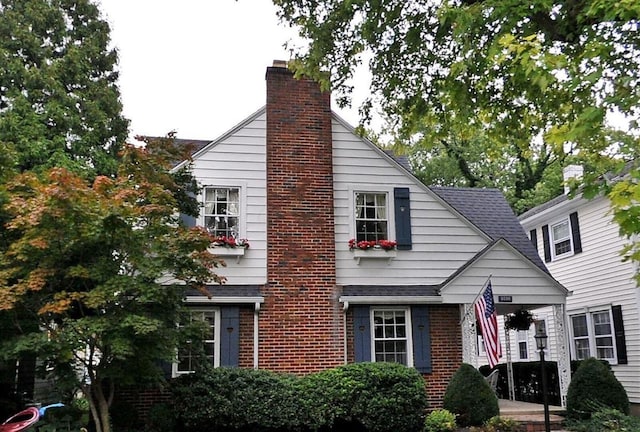 3036 Fairmont Ave, Dayton, OH 45429 - view of front of home with a chimney and brick siding