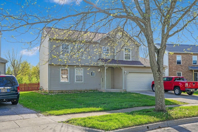 view of front of house featuring fence, driveway, a front yard, and a garage