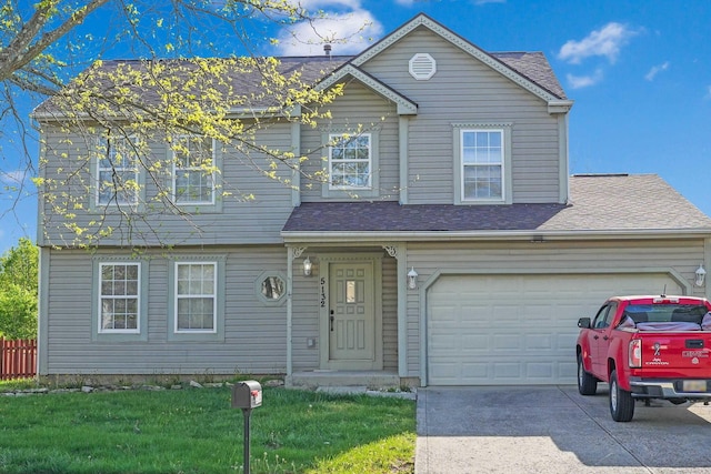 view of front of home featuring an attached garage, a front lawn, roof with shingles, and concrete driveway