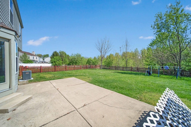 view of patio with central air condition unit, a fenced backyard, and a playground