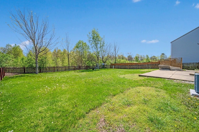 view of yard featuring a fenced backyard and a patio