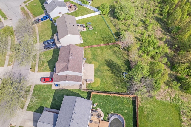 birds eye view of property with a residential view